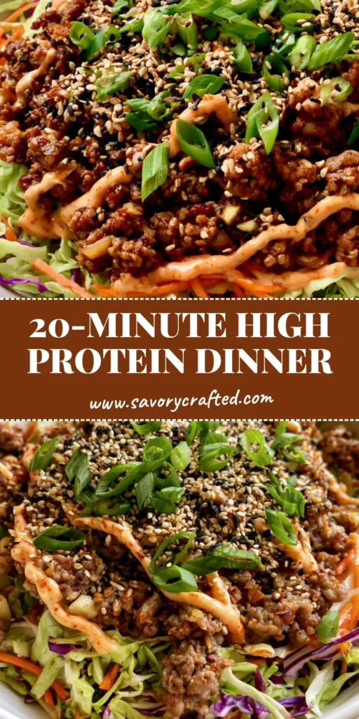 A shallow white ceramic bowl containing a High Protein Egg Roll in a Bowl with shredded green and purple cabbage, browned meat, and a sriracha mayo drizzle.